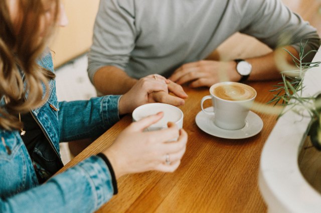 An image of a woman and a man at a coffee shop