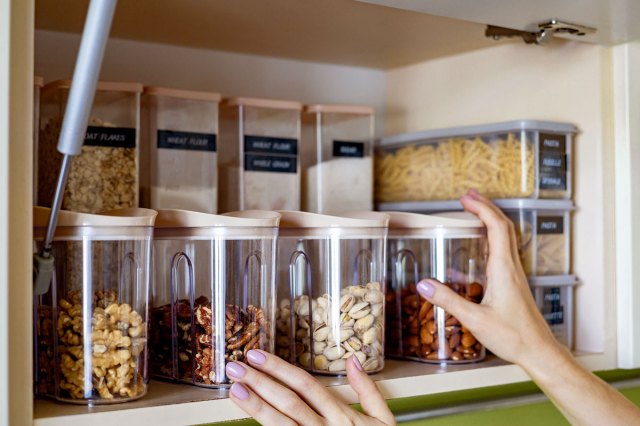 An image of plastic food storage containers on a shelf