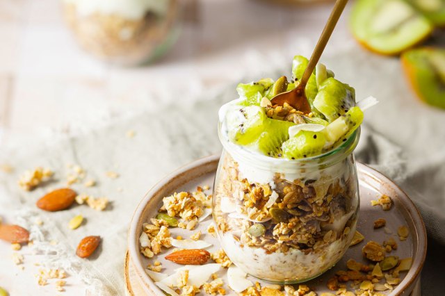 An image of a yogurt parfait with kiwi and granola