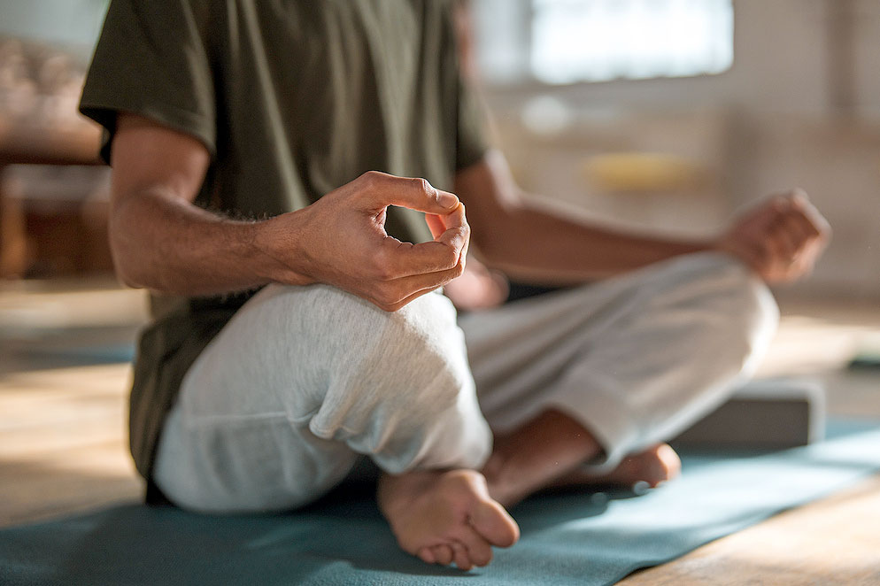 An image of a man meditating