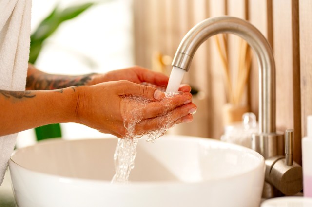 An image of a person washing their hands