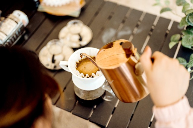 An image of a person making pour coffee