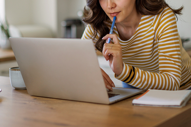 An image of woman on a laptop