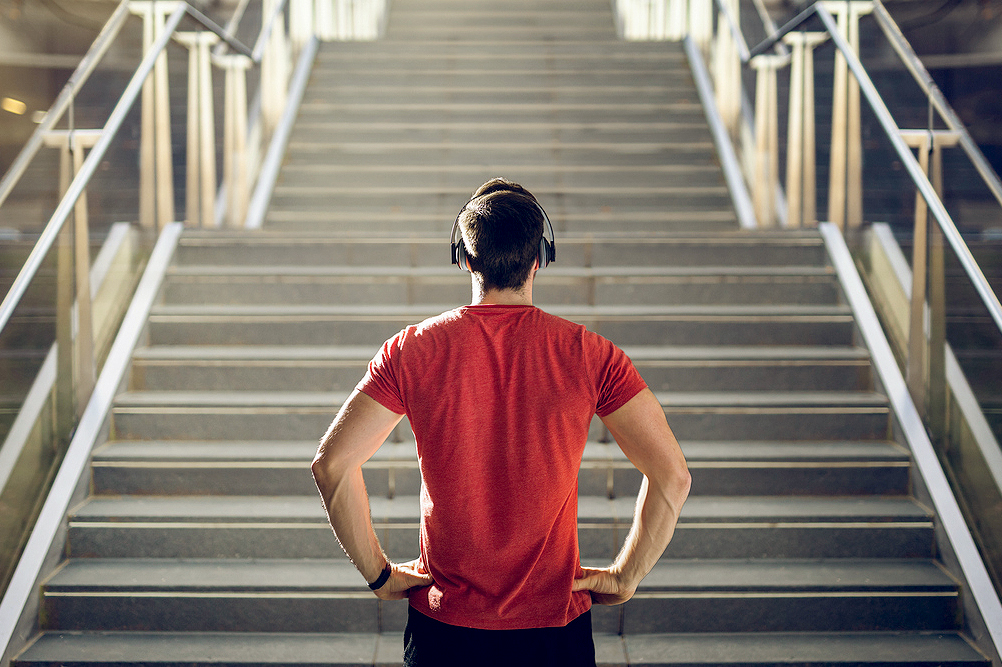 An image of a man looking at a staircase