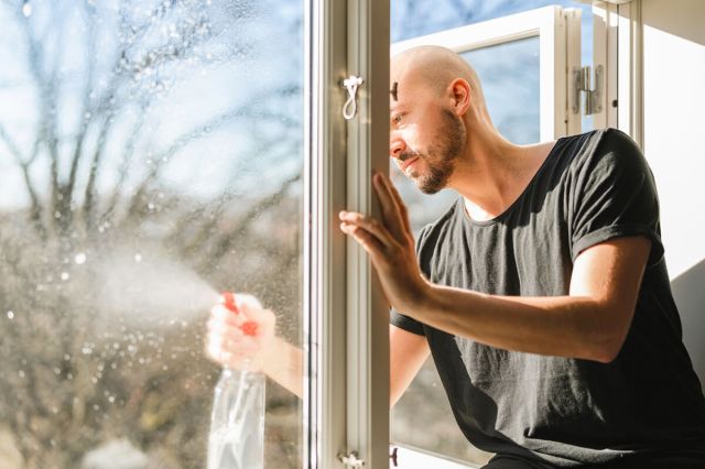 Man cleaning windows