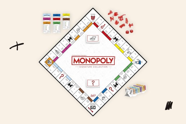 An image of a Monopoly board and pieces